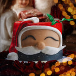 Decorative Santa Claus figure with a blurred festive background
