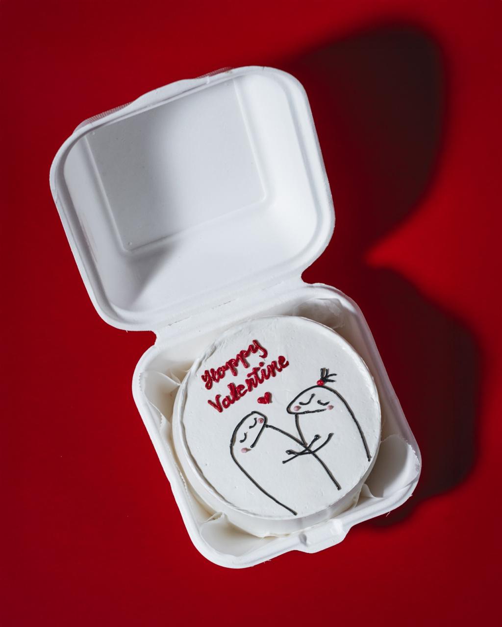 Valentine's Day-themed compact mirror with 'Happy Valentine' text on a red background