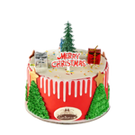 Christmas-themed cake with red icing, green trees, and 'Merry Christmas' decoration on a white background.