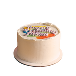 A small round birthday cake with colorful icing and 'Happy Birthday' written on it.