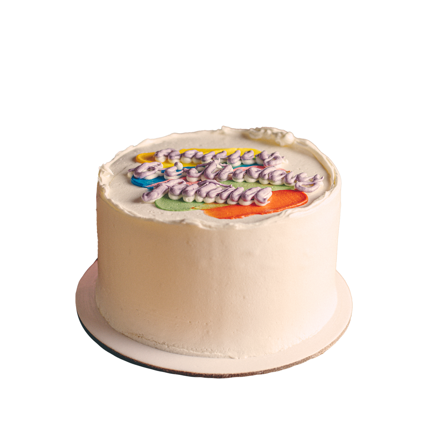 A small round birthday cake with colorful icing and 'Happy Birthday' written on it.