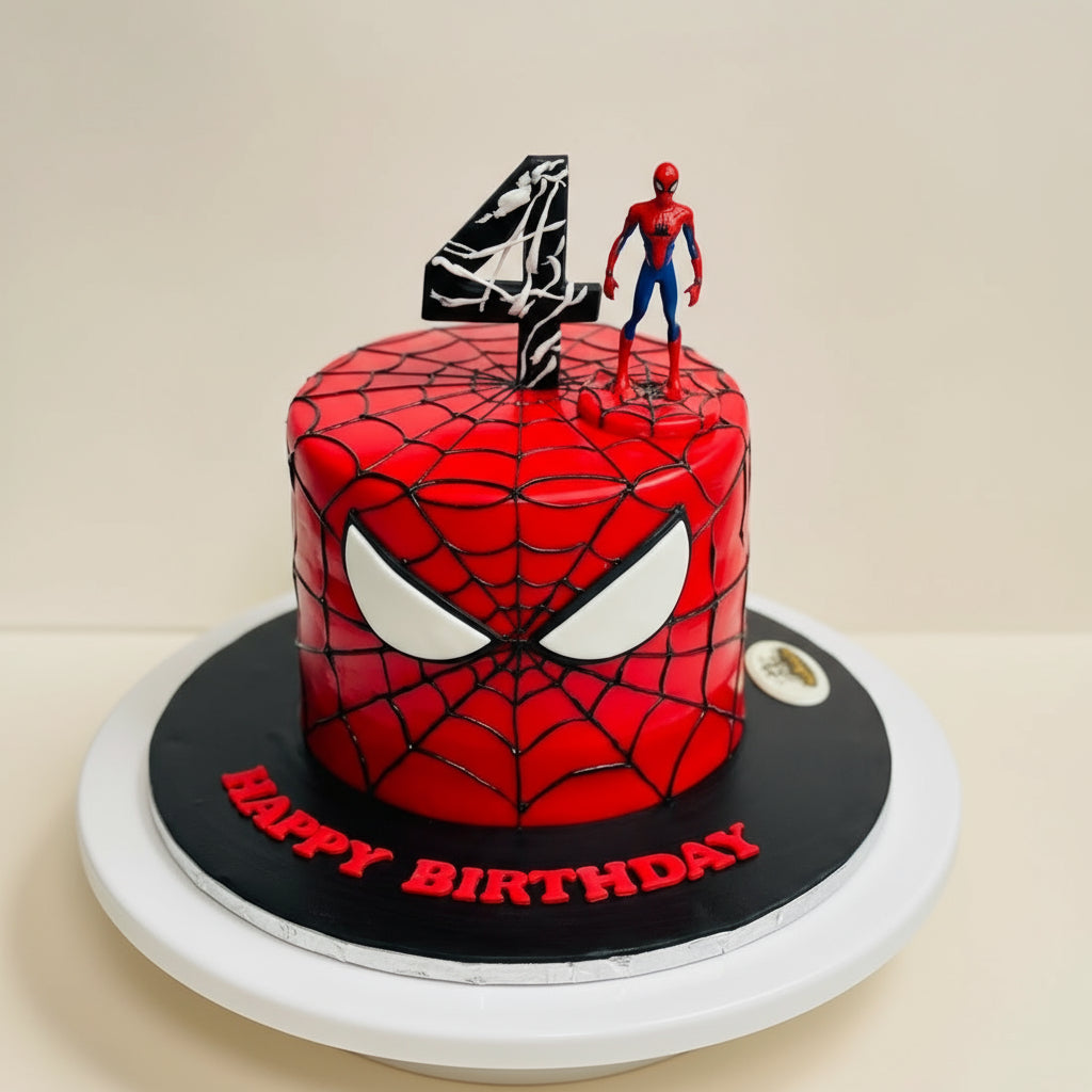 Spider-Man themed birthday cake with a number 4 topper on a beige background