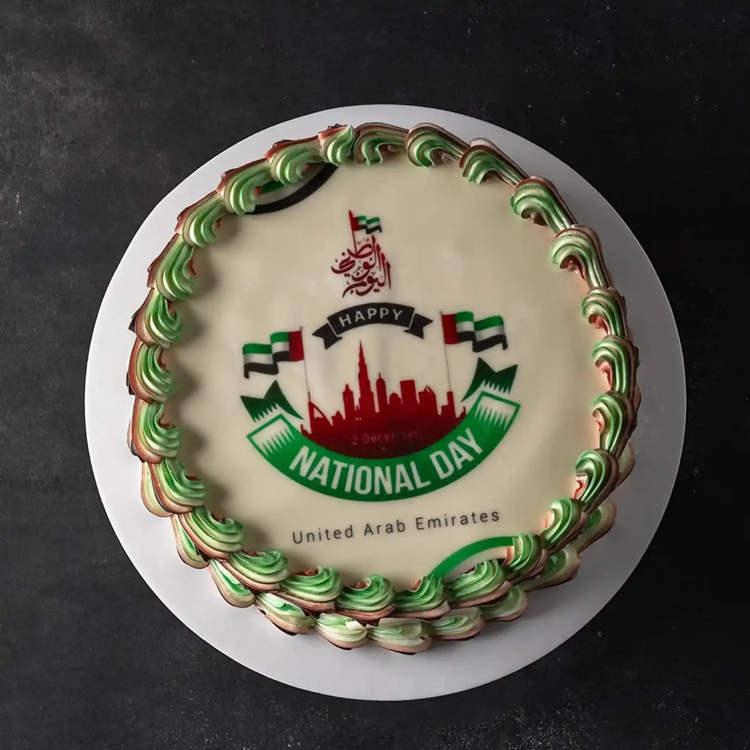 Cake with 'Happy National Day United Arab Emirates' text and design on a dark background