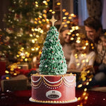 Decorative Christmas tree cake with a family in the background
