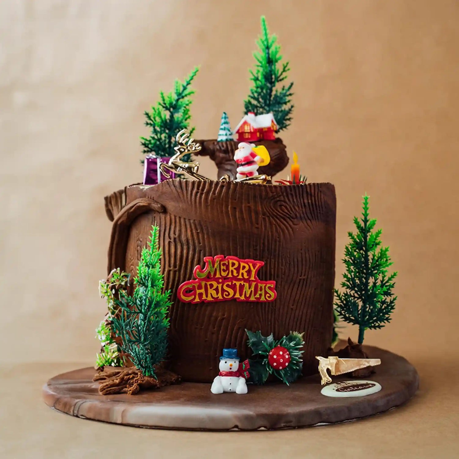 Christmas-themed cake with brown bag, trees, and decorative elements on a beige background