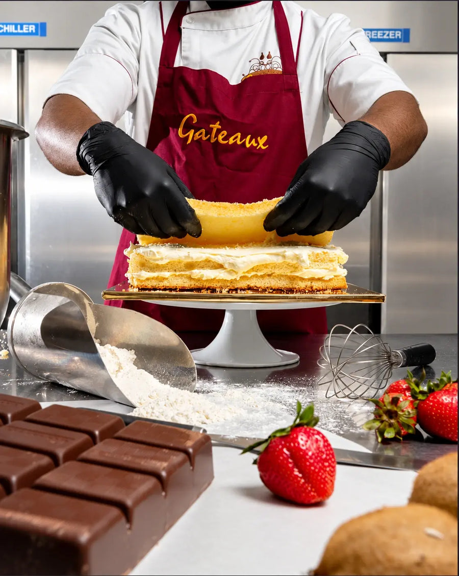 Gateaux pastry chef presenting a handcrafted cake